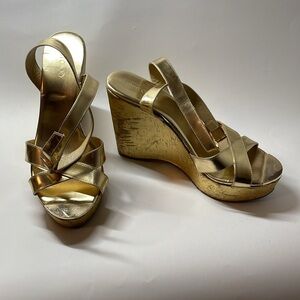 Jimmy Choo’s gold wedges    Size 41